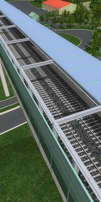 Eine Eisenbahnüberführung ist zu erkennen.