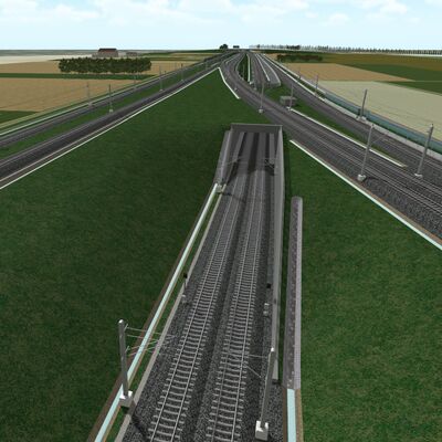 Zwei Bahnstrecken werden mit einer Überführung verbunden.