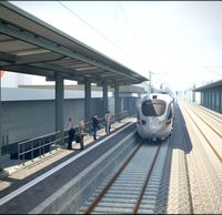 Eine Nahansicht des zukünftigen Bahnhofs Bad Krozingen. Am Bahnsteig fährt ein ICE ein.