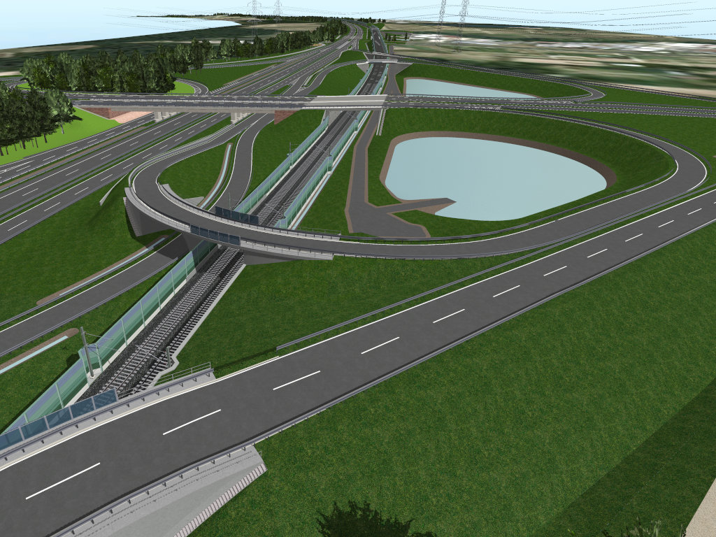 Eine Bahnstrecke führt unter einem Autobahnkreuz hindurch.